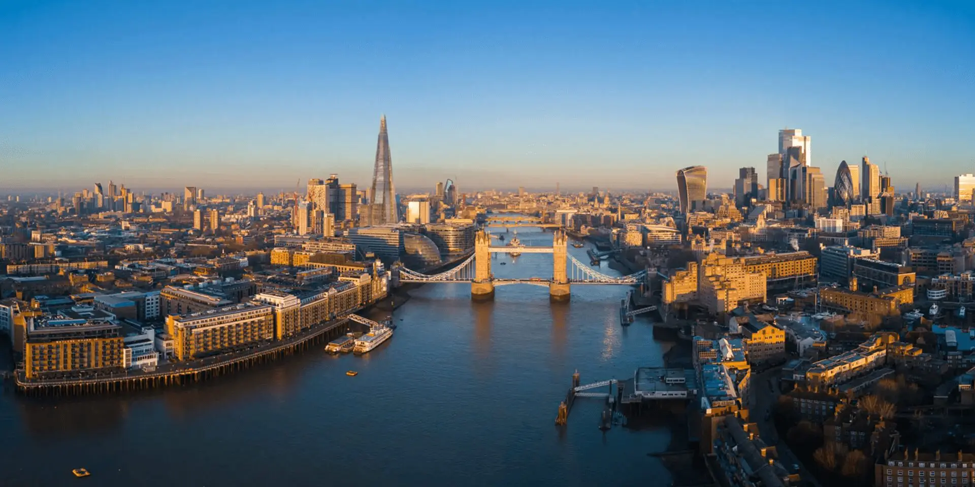 Aerial view of London skyline and river.